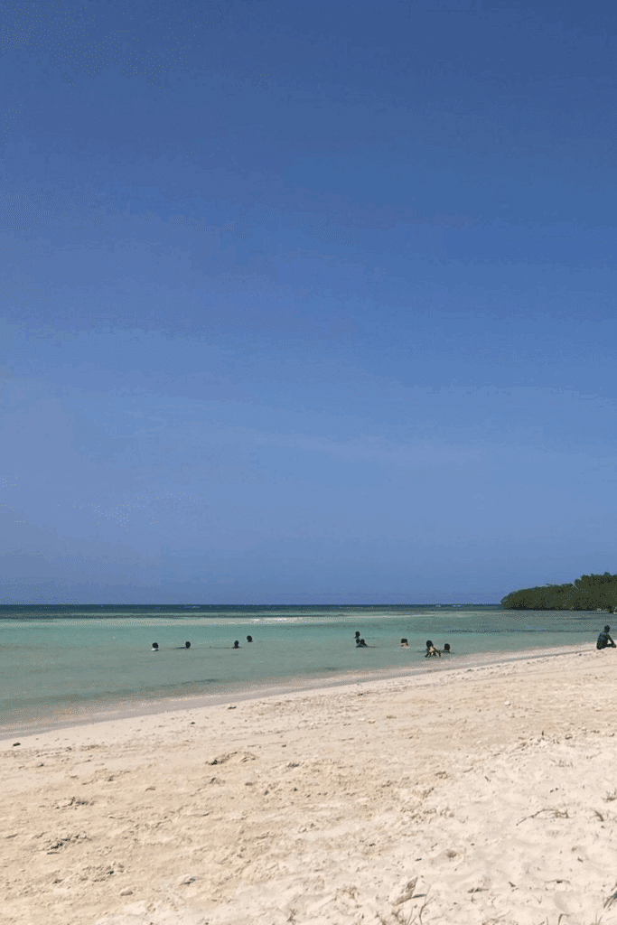Burwood Beach in Falmouth, Jamaica, with calm turquoise water and a quiet stretch of white sand