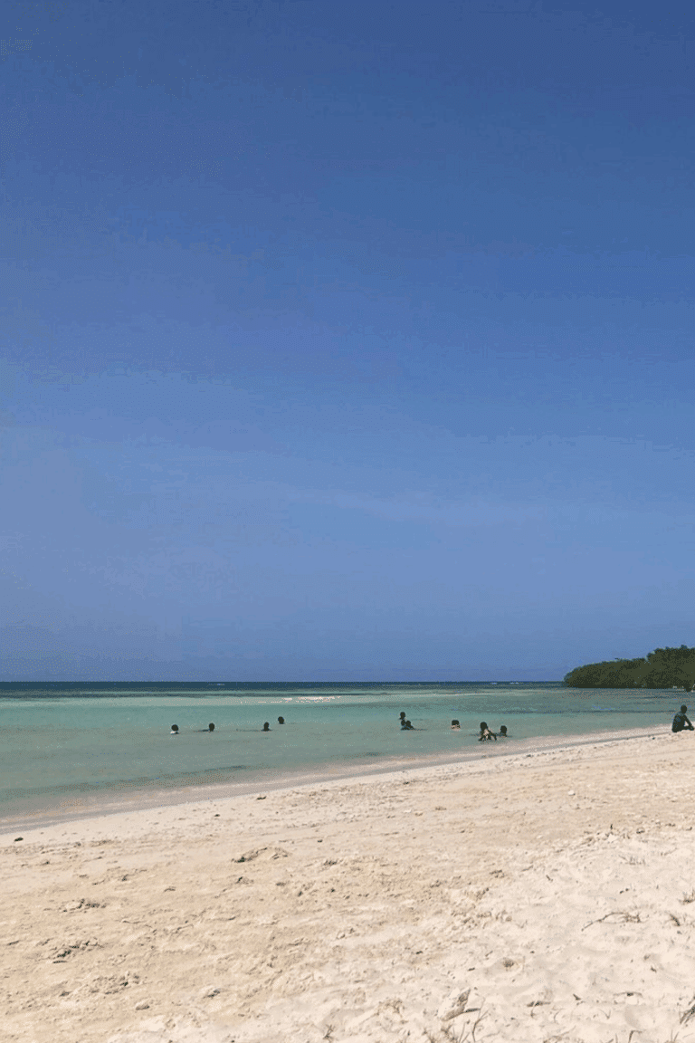 Burwood Beach in Falmouth, Jamaica, with calm turquoise water and a quiet stretch of white sand