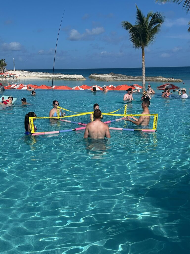 family playing a water game at hideaway beach