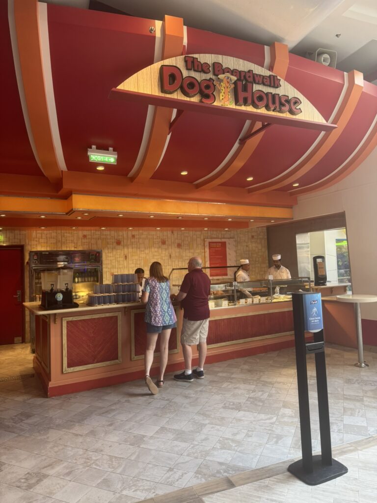 The Dog House on the Boardwalk with its bright red signage and walk‑up counter.