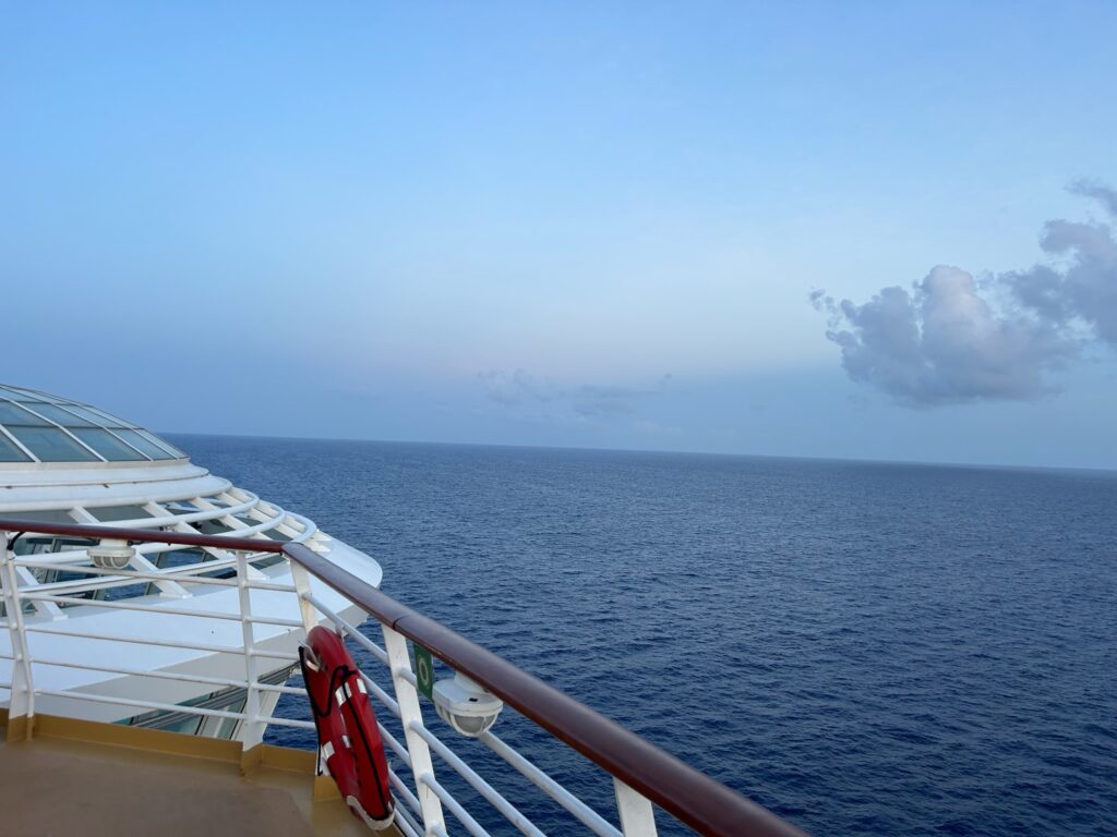 Ocean view from the cruise ship, symbolizing the peaceful setting often chosen for scattering ashes at sea.