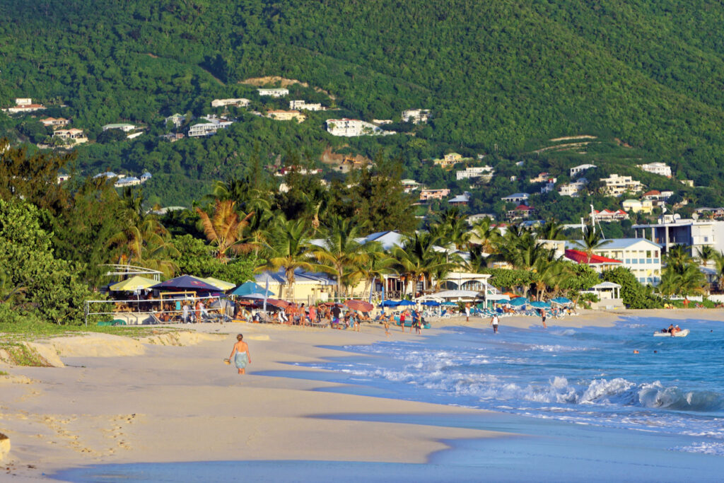 View of Simpson Bay in St. Martin with calm water, boats, and coastal scenery.