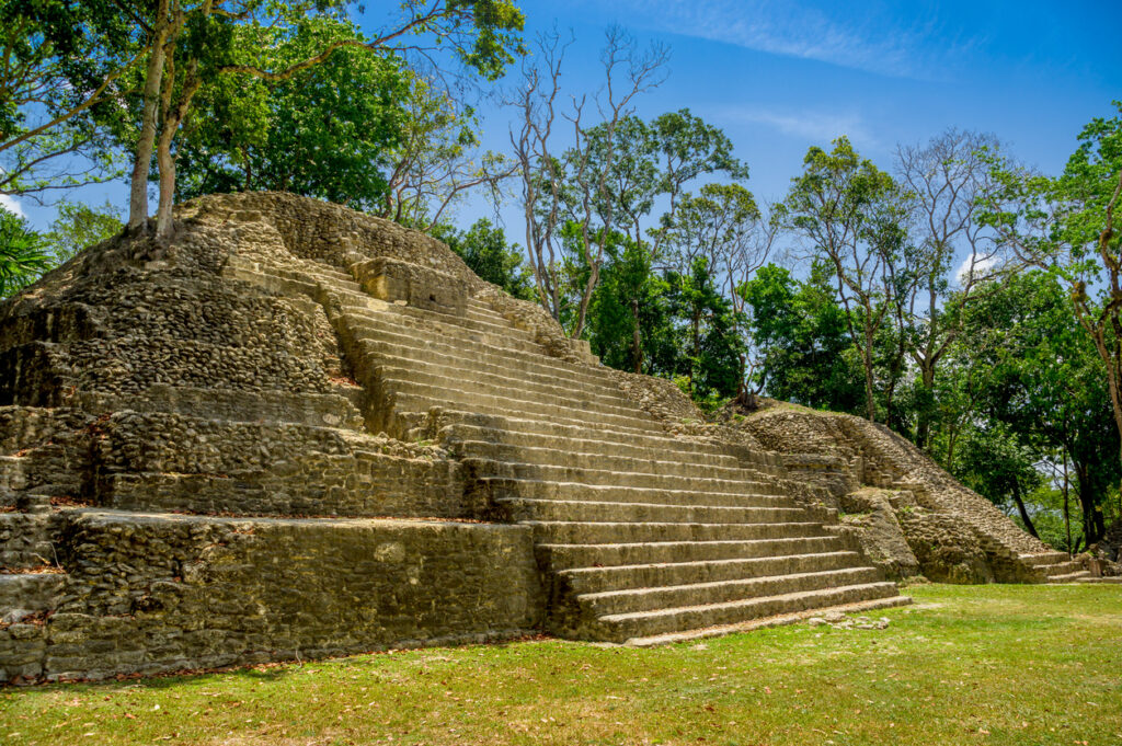 Cahal Pech Mayan Ruins in Belize with shaded courtyards and ancient stone structures