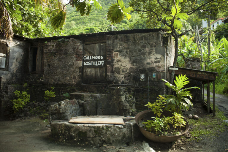 Historic stone building at Callwood Rum Distillery in Tortola, a family‑run Caribbean rum producer near Cane Garden Bay