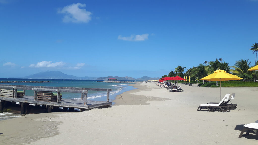 Paradise Beach on Nevis with clear turquoise water, soft sand, and a calm, quiet shoreline.