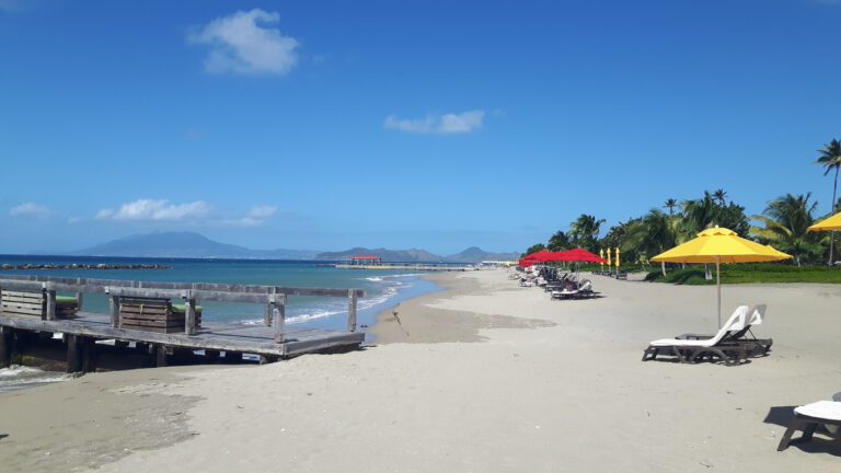 Paradise Beach on Nevis with clear turquoise water, soft sand, and a calm, quiet shoreline.