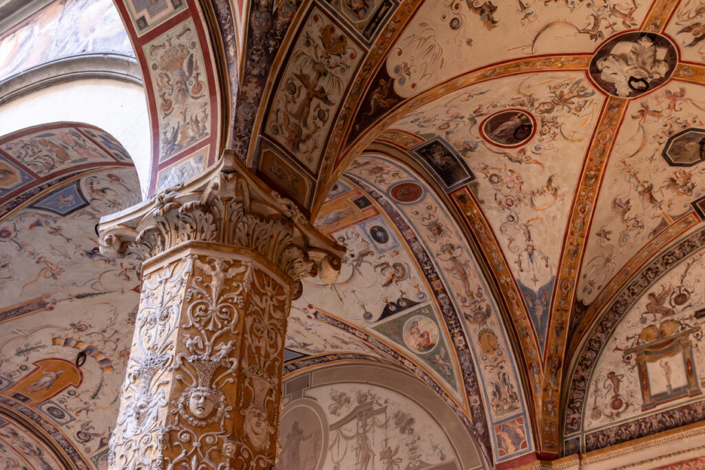 Wall frescoes of rich decorated courtyard of Palazzo Vecchio in Florence