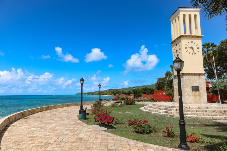 Clock tower along the Frederiksted waterfront promenade near Fort Frederik in St. Croix.