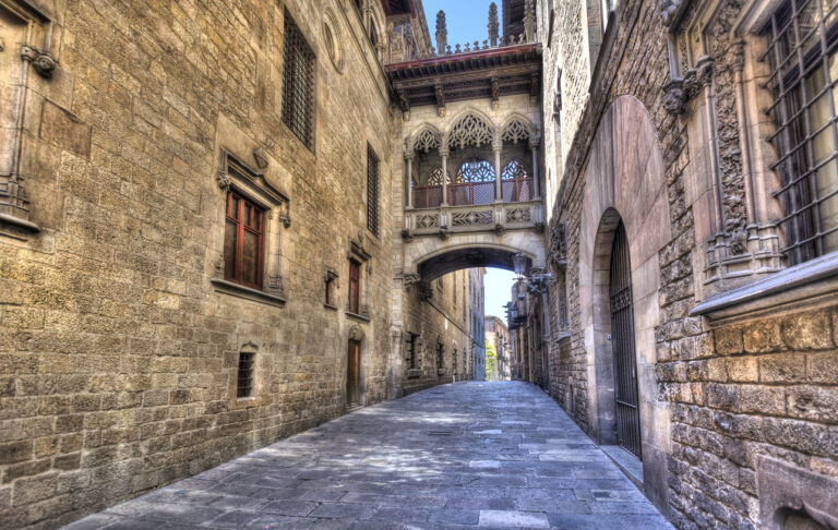 Flamboyant style bridge between buildings in El Bisbe street in the Gothic Quarter in central Barcelona, Spain