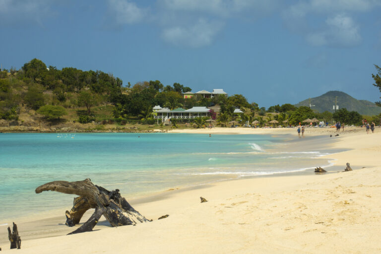 Wide stretch of soft sand and turquoise water at Josiah’s Bay on Tortola, a scenic Caribbean beach with gentle waves