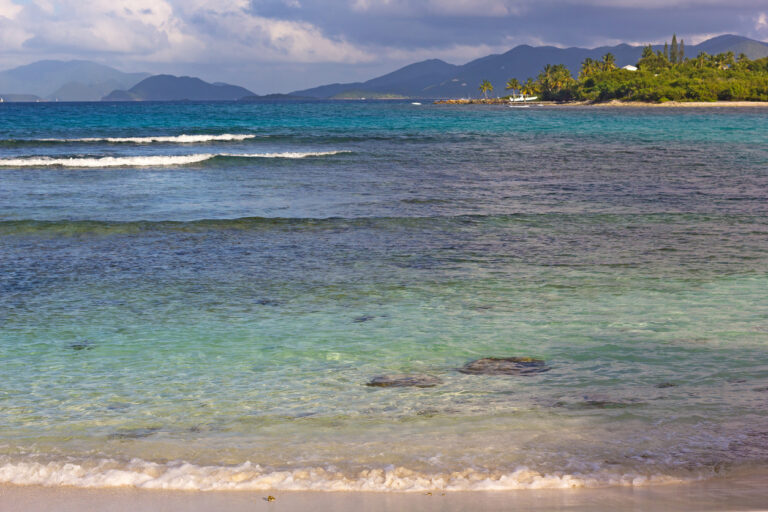 Bright turquoise water and soft white sand at Lindquist Beach in Smith Bay Park, St. Thomas