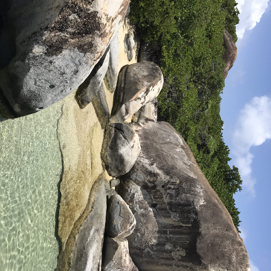 Massive granite boulders, turquoise water, and narrow rock passages at The Baths on Virgin Gorda in the British Virgin Islands