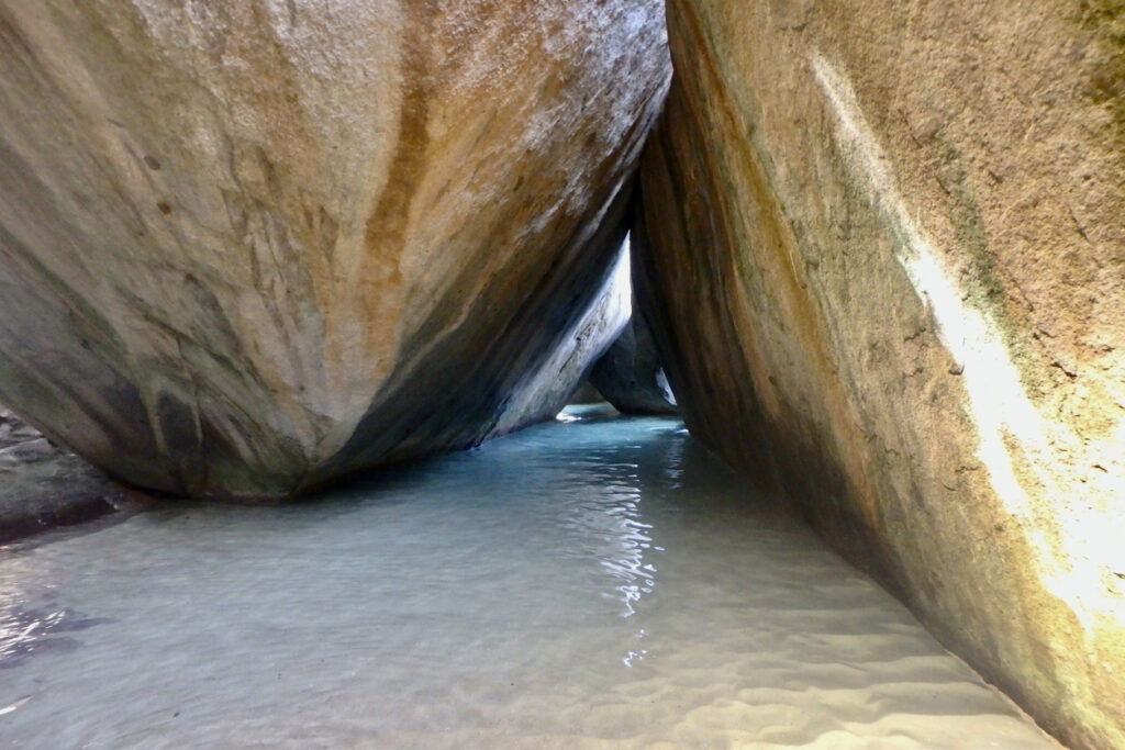 Massive granite boulders, turquoise water, and narrow rock passages at The Baths on Virgin Gorda in the British Virgin Islands