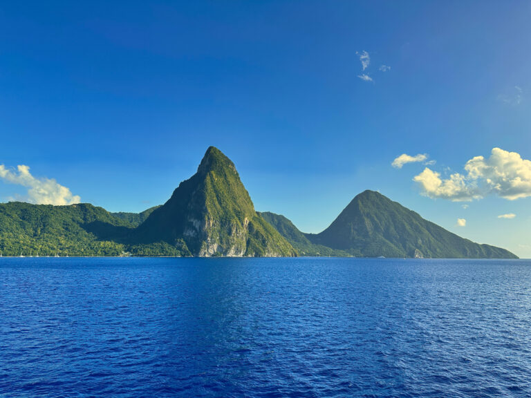 The Pitons rising above the Caribbean Sea near Soufrière on the southwestern coast of St. Lucia.