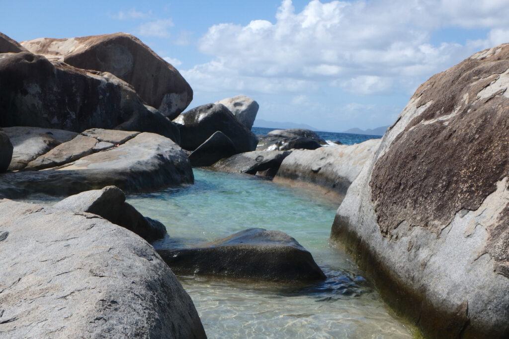 Massive granite boulders, turquoise water, and narrow rock passages at The Baths on Virgin Gorda in the British Virgin Islands