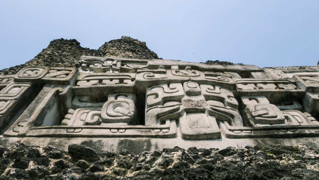 The Mayan archaeological site of Xunantunich in Belize, known for its towering temples and sweeping jungle views.