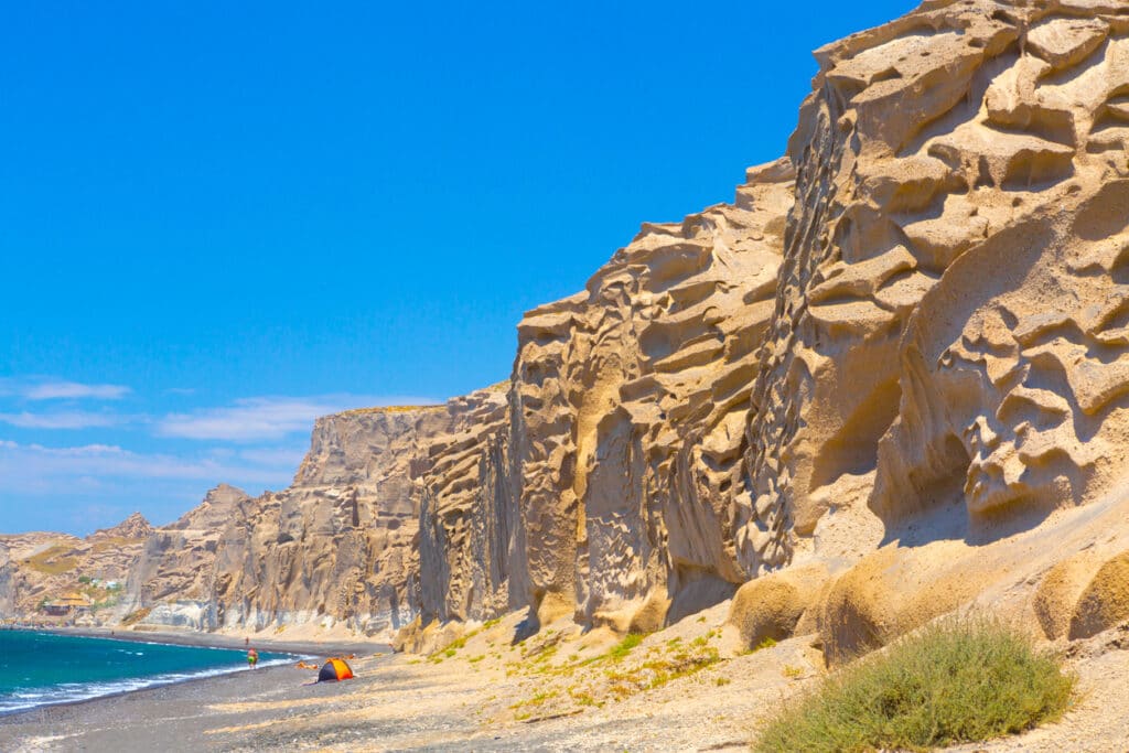 Beautiful beach with volcanic mountains. Vlychada beach, Santorini island, Greece