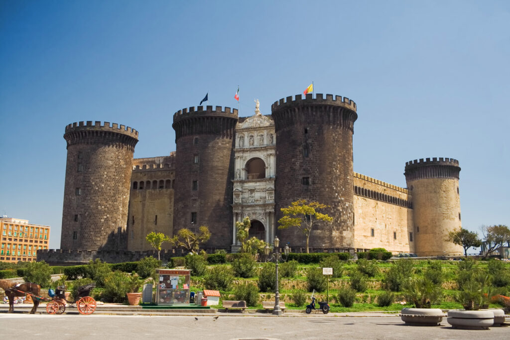 Exterior view of Castel Nuovo (Maschio Angioino) with its medieval towers and marble triumphal arch