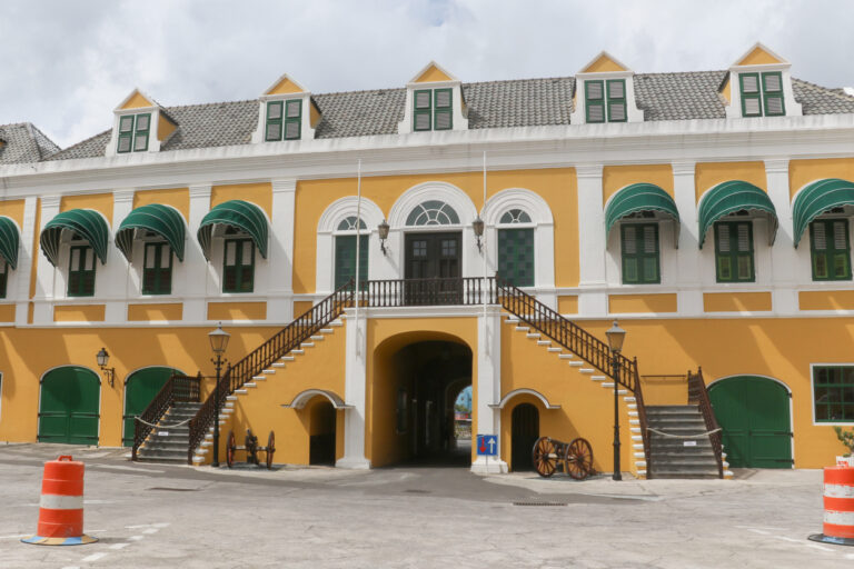 Colorful colonial buildings at Fort Amsterdam in Willemstad, Curaçao overlooking St. Anna Bay