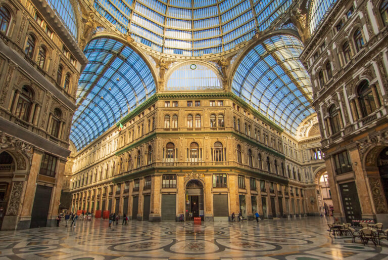 Interior of Galleria Umberto I in Naples with its glass dome and patterned marble floor