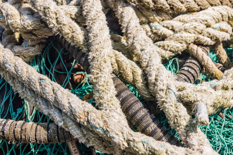 Close‑up of weathered nautical rope, reflecting the maritime heritage of Kodiak’s working waterfront.