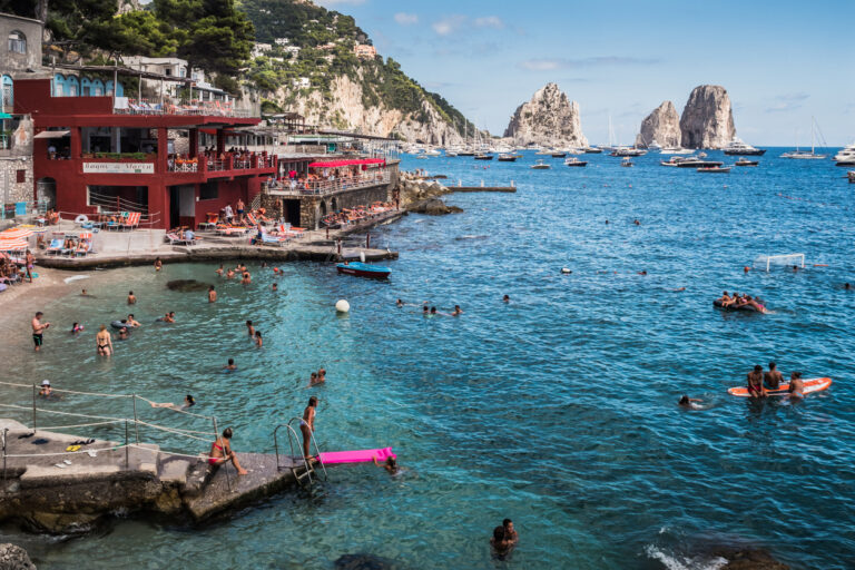 Marina Piccola cove in Capri with turquoise water and views of the Faraglioni rock formations